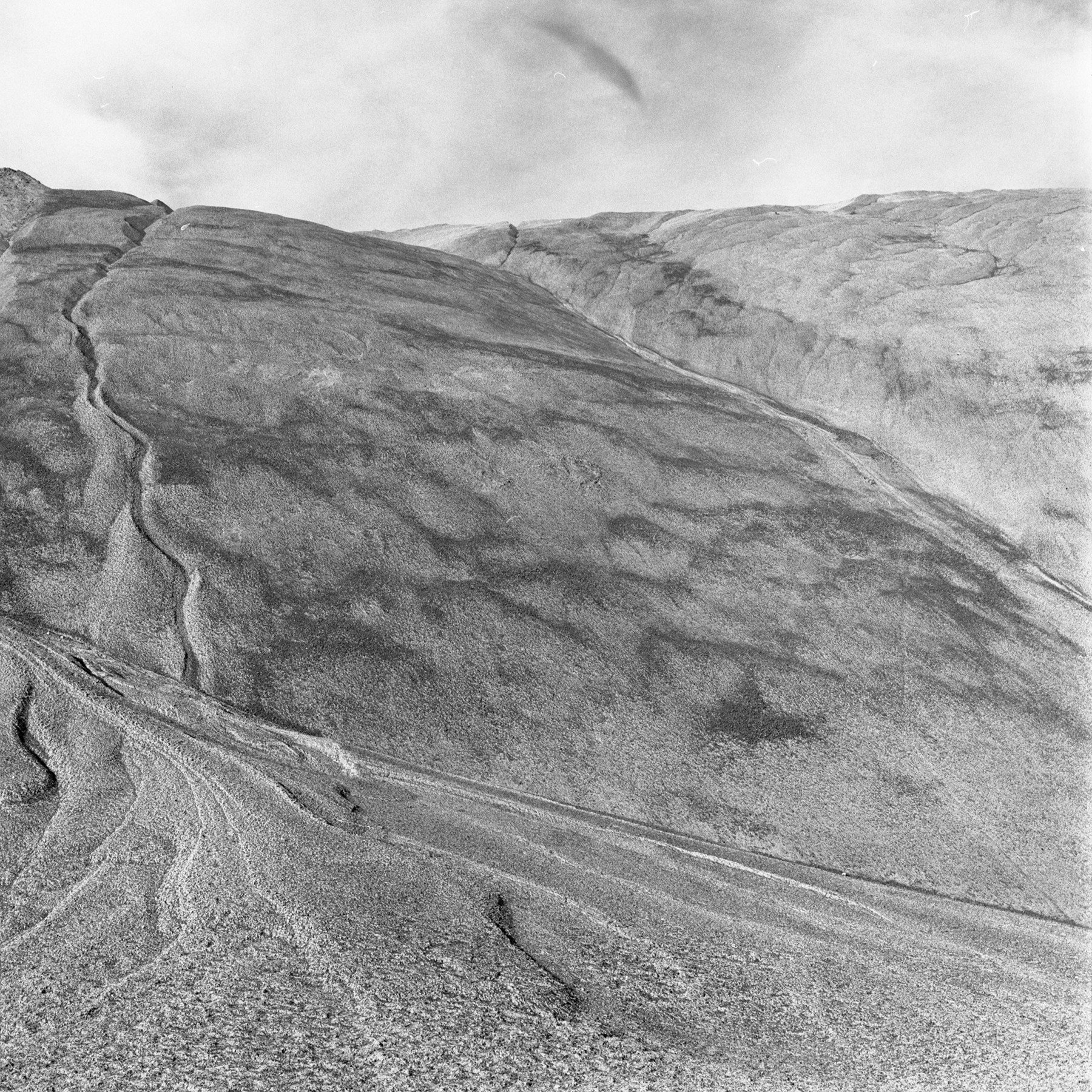 Greyscale image of mine tailings pile