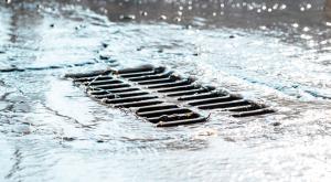 Stormwater flowing down a street drain 
