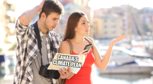 Couple in city stares at map with confused looks on their faces